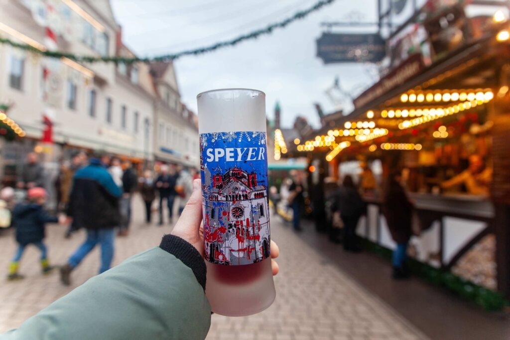 Speyer Christmas market holding a glass of mulled wine